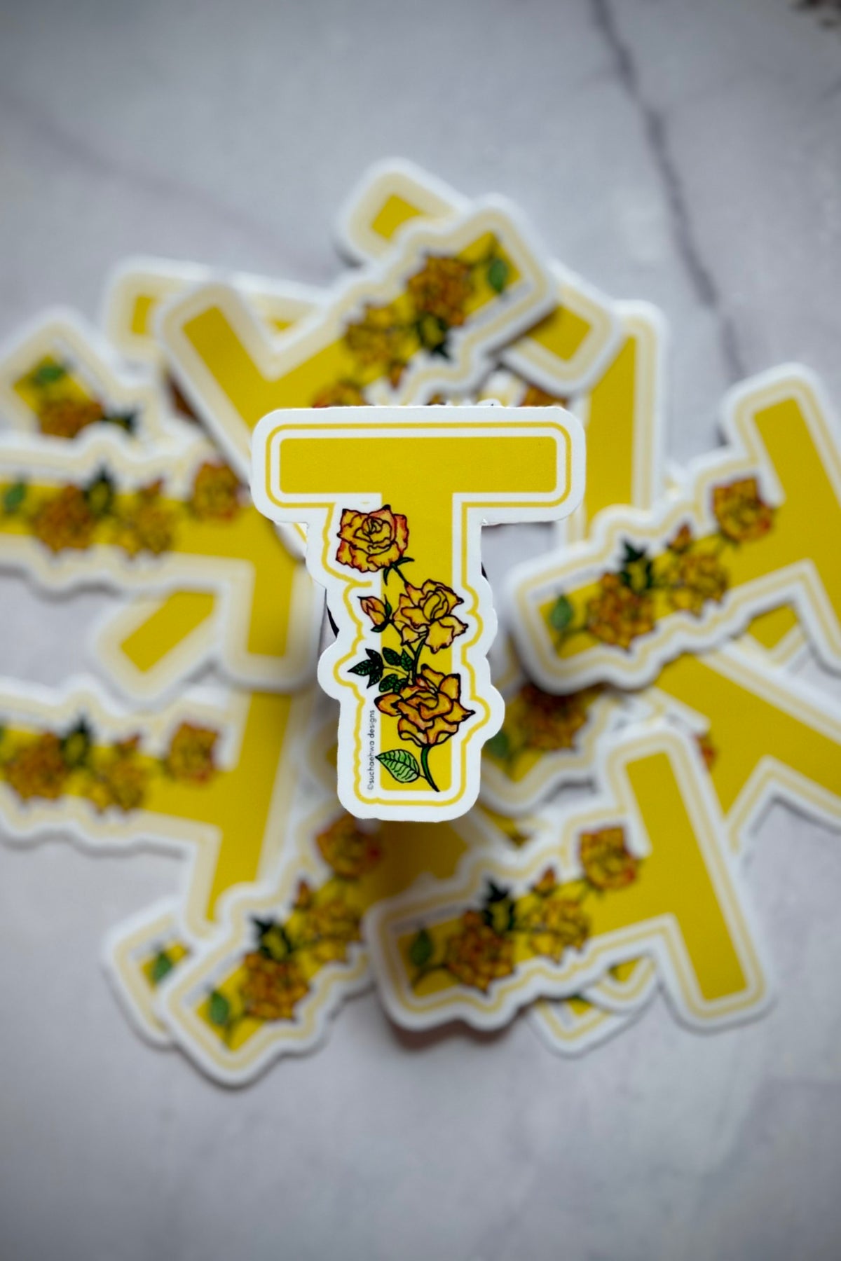 "T" Sticker
