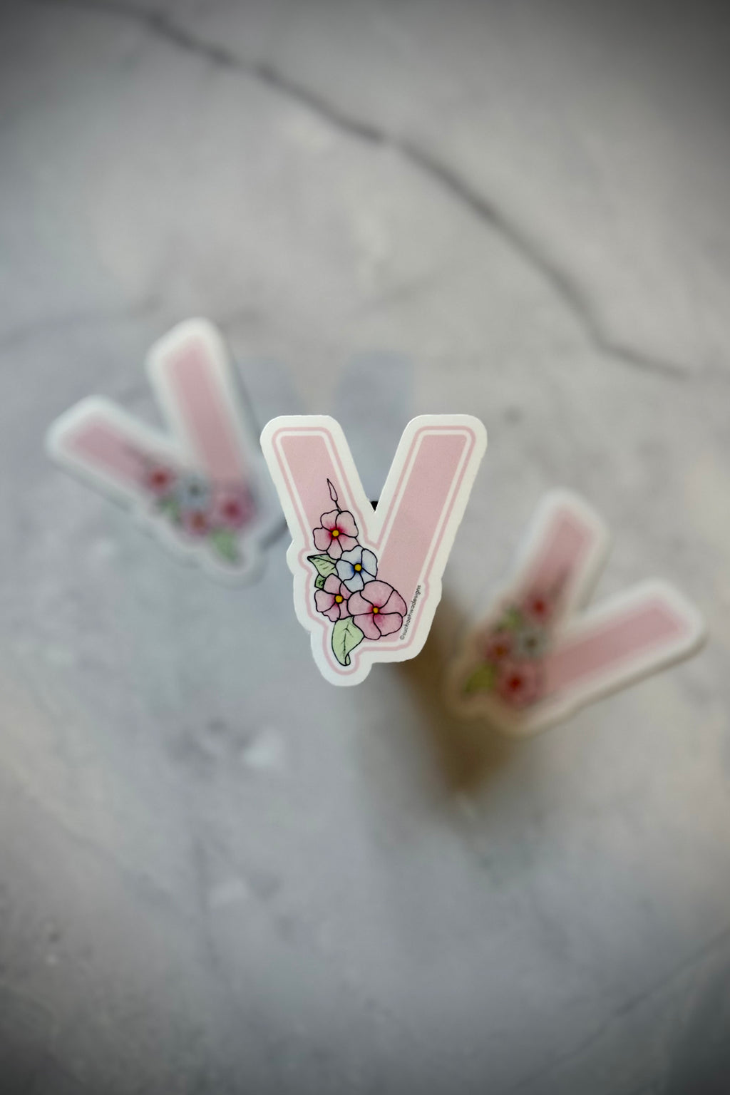 "V" Sticker