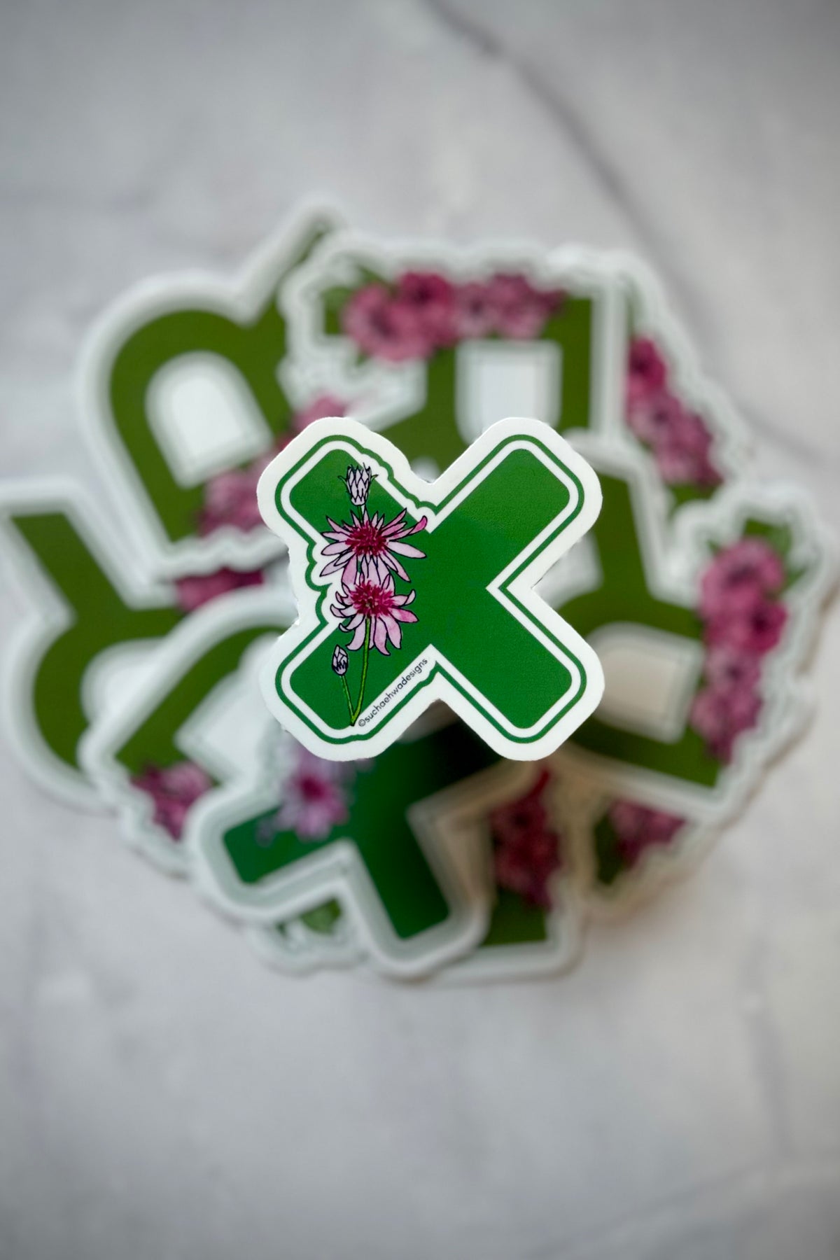 "X" Sticker