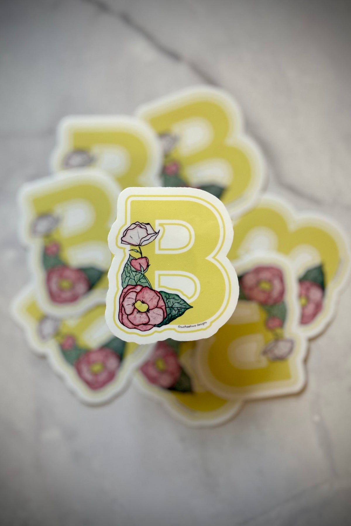 "B" Sticker