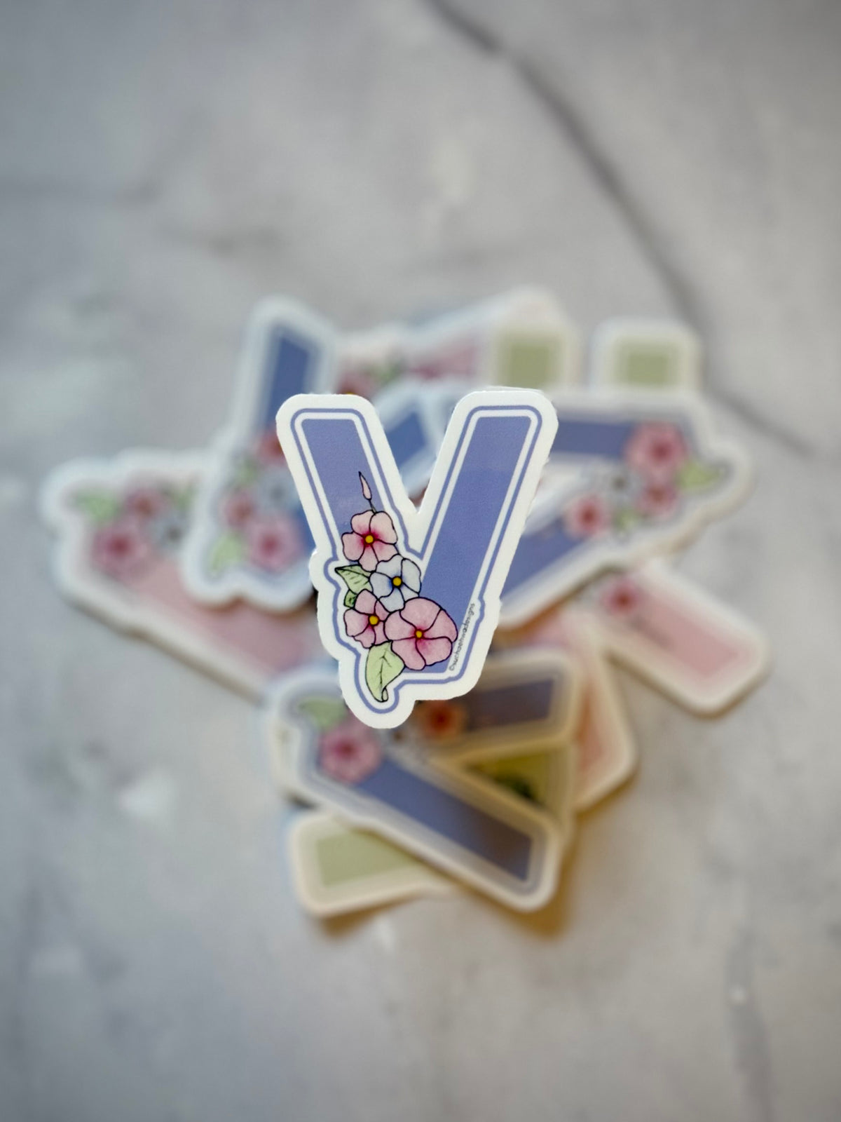 "V" Sticker