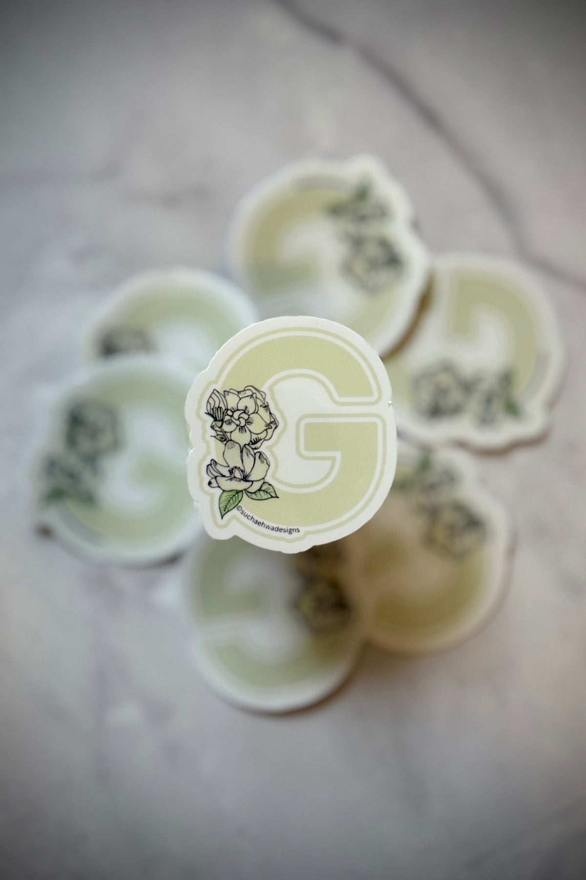 "G" Sticker