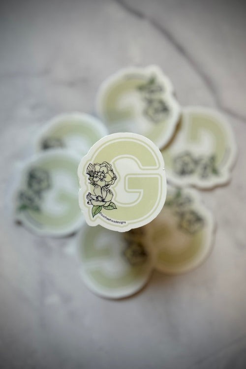 "G" Sticker